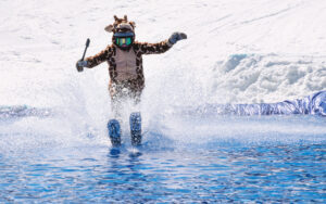 People are enjoying Pond skim at the end of ski season