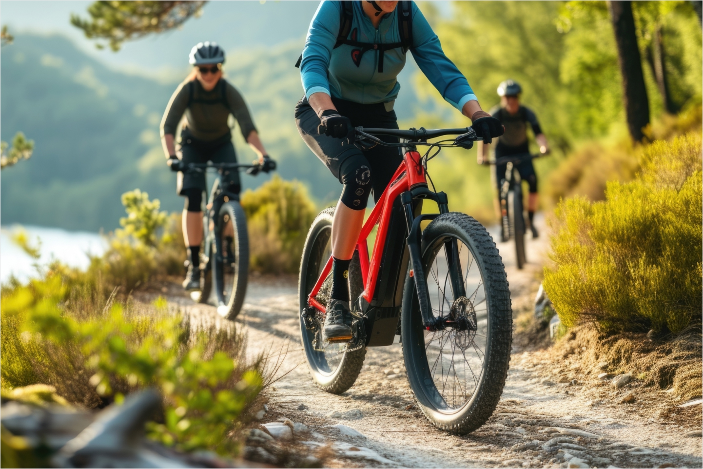 A family rides electric bikes on a trail near Newpark Resort, Park City.
